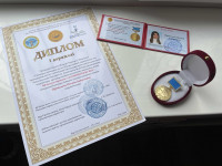 The teacher of the department "Marketing and Logistics" w"Маркетинг және логистика" кафедрасының оқытушысы Қазақстан Республикасы педагогтерінің "Алтын кітап-2021" республикалық конкурсында 1 дәрежелі дипломмен қанағаттандыas awarded a diploma of the 1st 